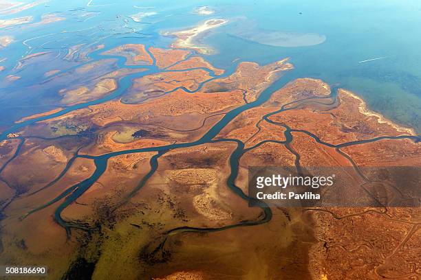 aerial view of lagoons near venice, veneto, italy, europe - river aerial stock pictures, royalty-free photos & images
