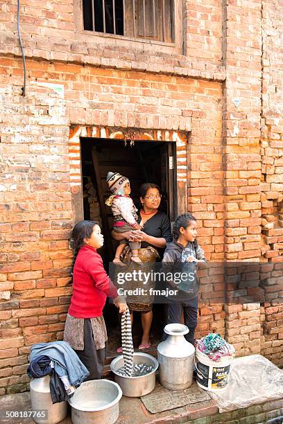 nepalese family - nepal family stock pictures, royalty-free photos & images