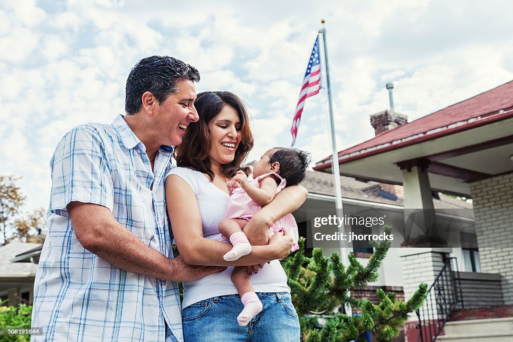 Young Family at Home with New Baby Girl