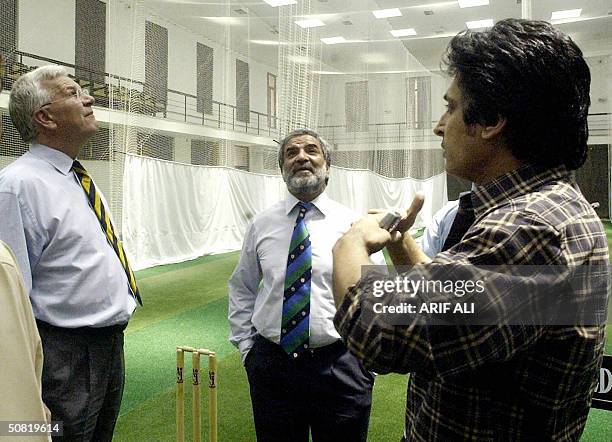 Paksitan Cricket Board Chief Executive Ramiz Raja gestures as he speaks with Chief Executive of the International Cricket Council Malcolm Speed and...