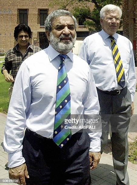 Paksitan Cricket Board Chief Executive Ramiz Raja accompanies the Chief Executive of the International Cricket Council Malcolm Speed and ICC...