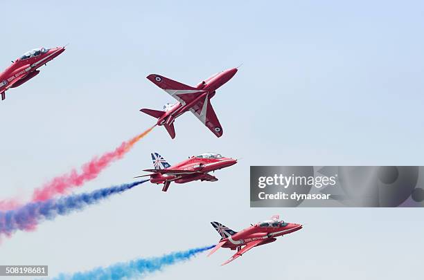 raf red arrows aerobatic display team - red arrow plane stock pictures, royalty-free photos & images
