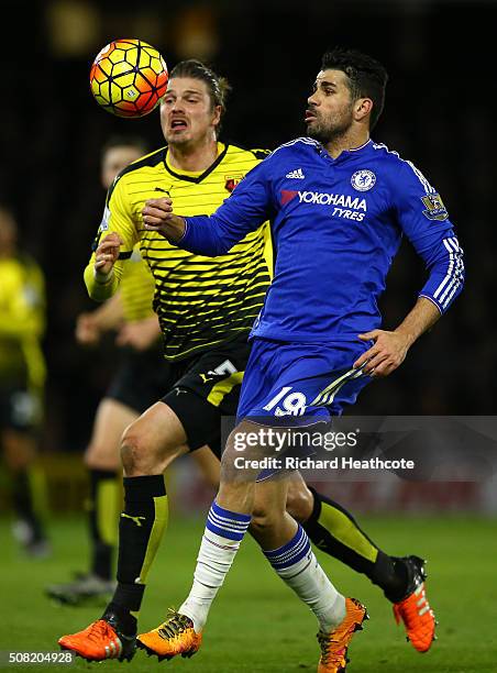 Sebastian Prodl of Watford and Diego Costa of Chelsea compete for the ball during the Barclays Premier League match between Watford and Chelsea at...