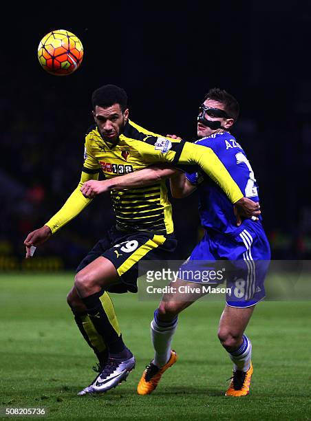 Etienne Capoue of Watford and Cesar Azpilicueta of Chelsea compete for the ball during the Barclays Premier League match between Watford and Chelsea...