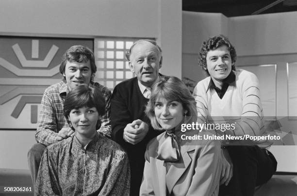 Television Breakfast Time presenting team posed together in the Breakfast Time studio in London on 21st December 1982. From left to right: Weather...