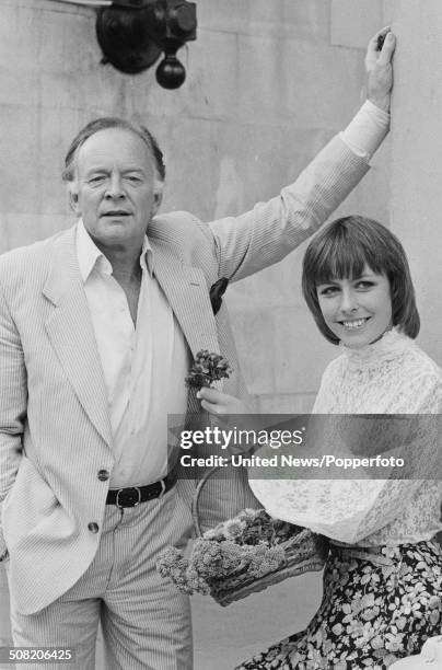 English actor Tony Britton posed with actress and singer Liz Robertson during rehearsals for the musical My Fair Lady at the Adelphi Theatre in...