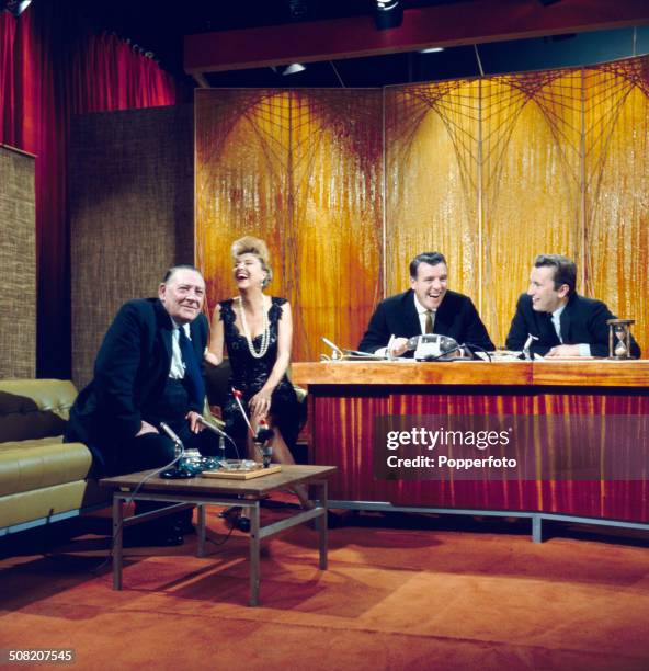 American entertainer Gypsy Rose Lee appears with David Frost , trade unionist Ted Hill and chat show host Eamonn Andrews on the set of the television...