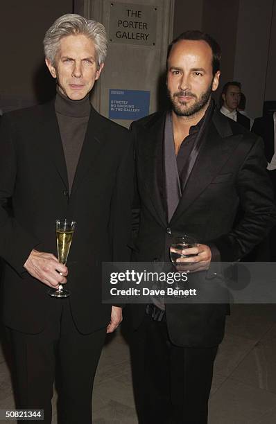 Tom Ford and partner attend the Mario Testino Exhibition at The National Portrait Gallery on January 30, 2002 in London.