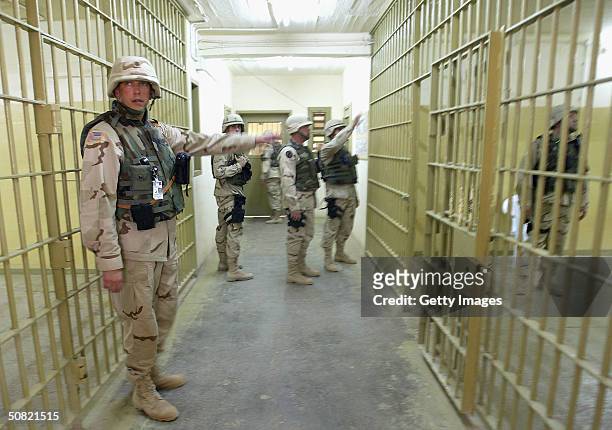 Soldiers maintain security at the Abu Ghraib prison May 10, 2004 in Abu Ghraib, Iraq. Allegations of abuse at the prison, notorious under the Saddam...