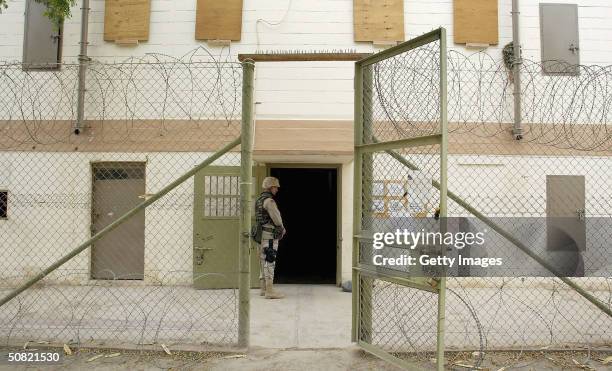 Soldiers maintain security at the Abu Ghraib prison May 10, 2004 in Abu Ghraib, Iraq. Allegations of abuse at the prison, notorious under the Saddam...