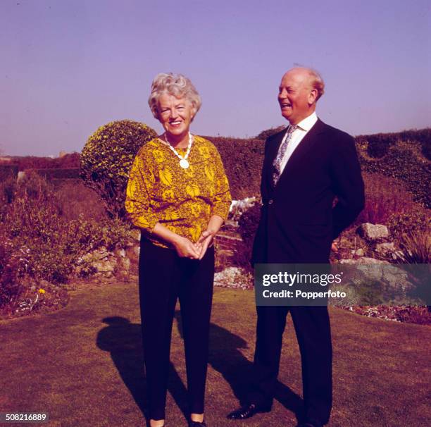 English actress and singer Gracie Fields posed with the journalist Godfrey Winn on the Italian island of Capri in 1965.