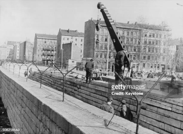 Second wall under construction to further fortify the border at the Berlin Wall at Bernauer Strasse, Berlin, Germany, April 1967.