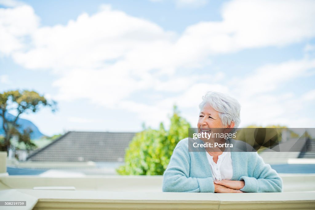 Senior woman looking away on terrace