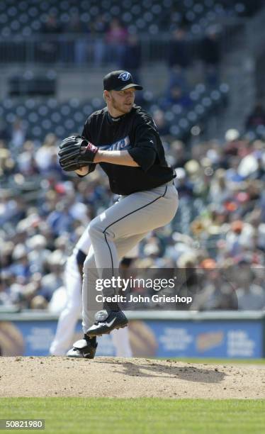 Roy Halladay of the Toronto Blue Jays pitches during the MLB game against the Detroit Tigers at Comerica Park on April 15, 2004 in Detroit, Michigan....