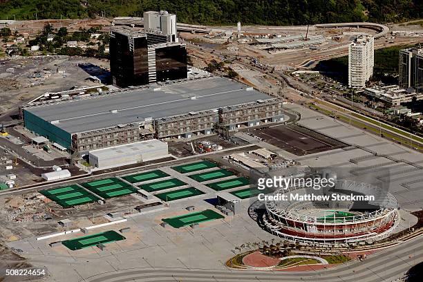 Construction continues at the International Broadcast Center , the Main Press Center and the Olympic Tennis Centre at the Olympic Park for the Rio...