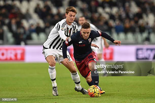 Daniele Rugani of Juventus FC competes with Diego Capel of Genoa CFC during the Serie A match between Juventus FC and Genoa CFC at Juventus Arena on...