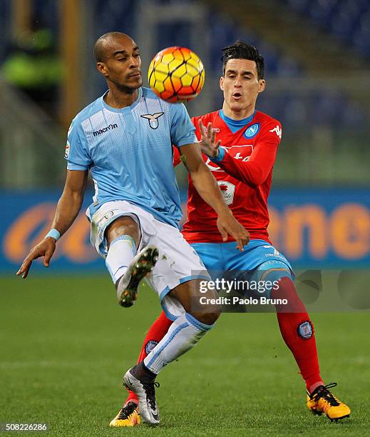 Jose' Callejon of SSC Napoli competes for the ball with Abdoulay Konko of SS Lazio during the Serie A match between SS Lazio and SSC Napoli at Stadio...