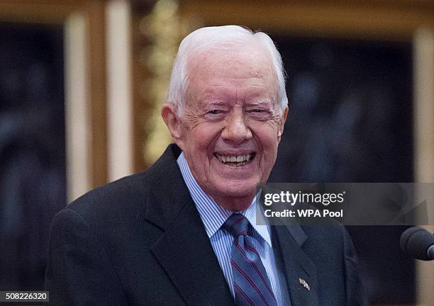 Former U.S. President Jimmy Carter receives delivers a lecture on the eradication of the Guinea worm, at the House of Lords on February 3, 2016 in...