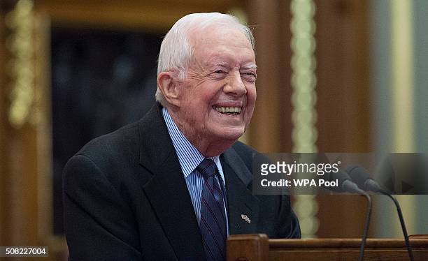 Former U.S. President Jimmy Carter receives delivers a lecture on the eradication of the Guinea worm, at the House of Lords on February 3, 2016 in...