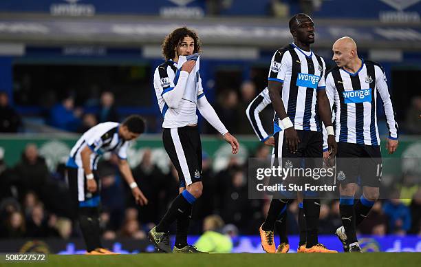 Newcastle players Fabricio Coloccini Moussa Sissoko and Jonjo Shelvey reacts after the first Everton penalty is given during the Barclays Premier...