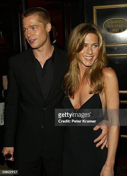 Actors Brad Pitt and wife Jennifer Aniston attend the premiere of "Troy" on May 10, 2004 in New York City.