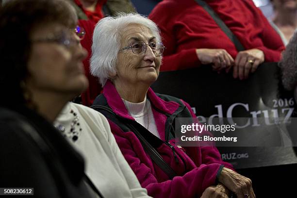 Attendees listen as Senator Ted Cruz, a Republican from Texas and 2016 presidential candidate, not pictured, speaks during a campaign stop at the...