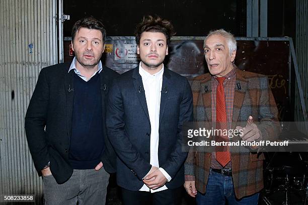 Main Guest of the Show, Actor and Humorist Kev Adams standing between Actors Philippe Lellouche and Gerard Darmon attend the 'Vivement Dimanche'...