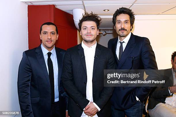 Actor Majid Berhila, Youngest Main Guest of the Show, Actor and Humorist Kev Adams and Actor Vincent Elbaz present the Movie "Amis Public" during the...