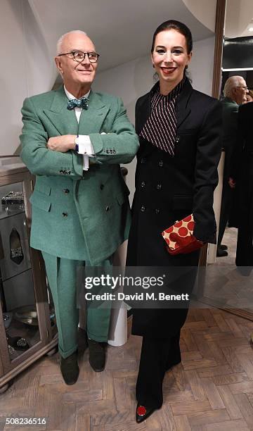 Manolo Blahnik and Christina Blahnik attend an evening of shopping and cocktails with Manolo Blahnik and British Vogue at the new Manolo Blahnik...