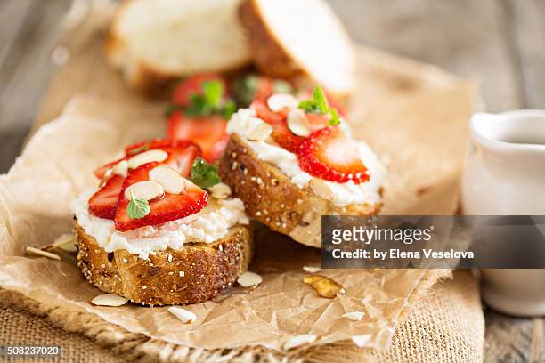 strawberry and ricotta bruschetta with honey - crostini stock pictures, royalty-free photos & images