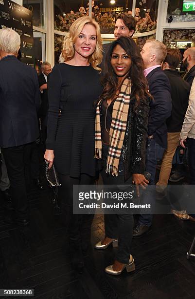 Jacqui Brantjes and Sinitta attend a private view of "Decadence", the new exhibition by American photographer Tyler Shields, at Maddox Gallery on...