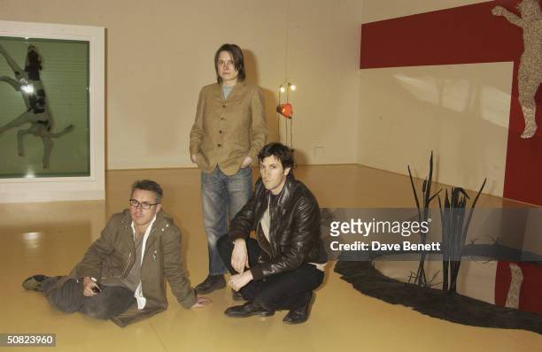 Artists Angus Fairhurst, Damien Hirst and Sarah Lucas at the launch of In-A-Gadda-Da-Vida Art Exhibition, show casing their work held at The Tate...