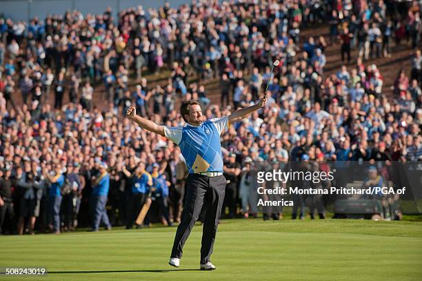Graeme McDowell sinks his putt on the sixteenth hole during the session four singles matches at the 38th Ryder Cup at the Twenty Ten Course at Celtic...