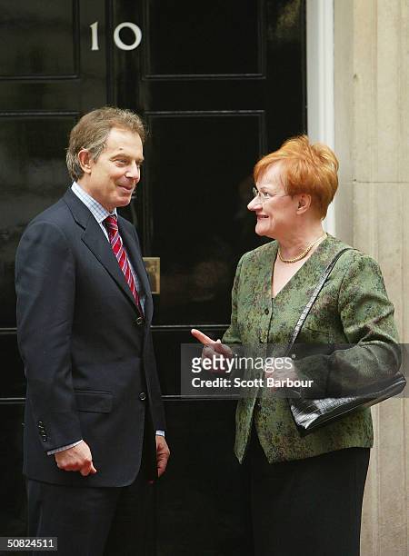 Britain's Prime Minister Tony Blair and President of Finland, Tarja Halonen say their farewells on May 11, 2004 in London, England.