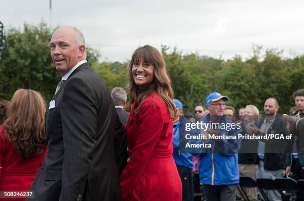 Tom Lehman and Melissa Lehman exit during the Opening Ceremonies at the 38th Ryder Cup at the Twenty Ten Course at Celtic Manor in Newport, Wales, on...