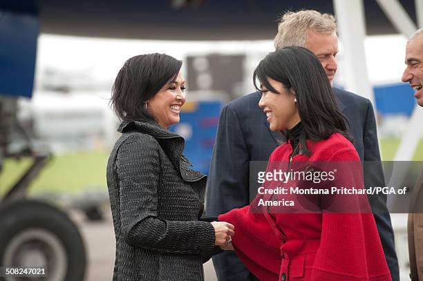Gaynor Montgomerie greets Lisa Pavin at the 38th Ryder Cup at the Cardiff Airport in Cardiff, Wales, on Monday, September 27, 2010.