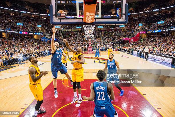 Nikola Pekovic of the Minnesota Timberwolves shoots over Tristan Thompson of the Cleveland Cavaliers during the second half at Quicken Loans Arena on...