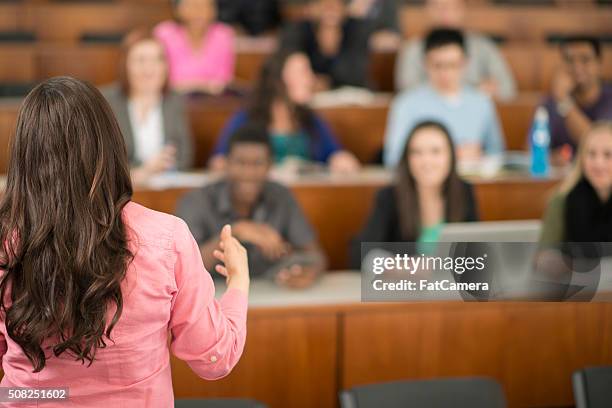 professor giving a lecture - auditorium stock pictures, royalty-free photos & images