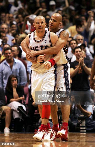 Richard Jefferson hugs teammate Jason Kidd of the New Jersey Nets after Kidd made a basket to put the Nets' up 74-56 in the third quarter against the...