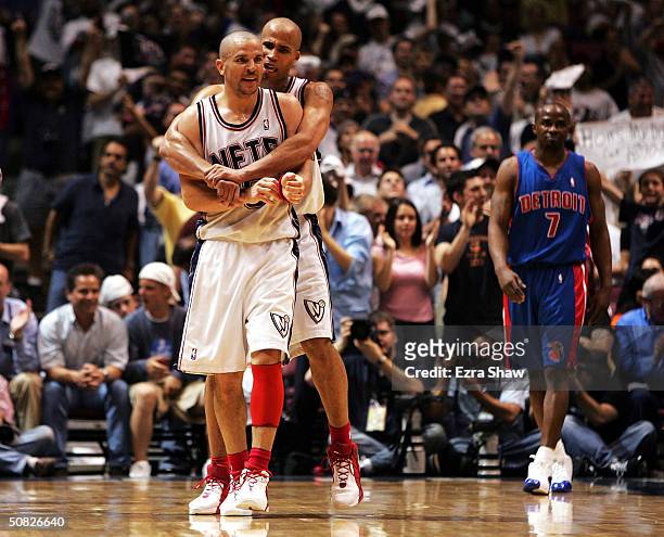 Richard Jefferson hugs teammate Jason Kidd of the New Jersey Nets after Kidd made a basket to go up 74-56 in the third quarter against the Detroit...