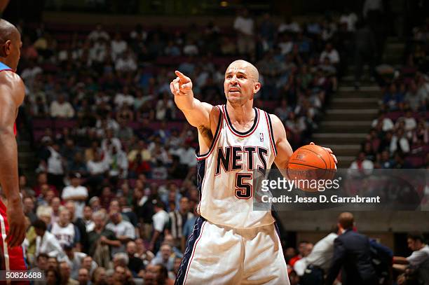 Jason Kidd of the New Jersey Nets ldirects the offense against Chauncey Billups of the Detroit Pistons in Game four of the Eastern Conference...
