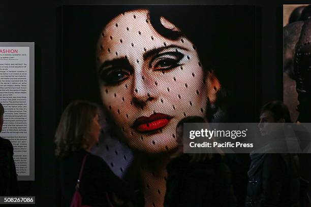 Visitors looking at photos during the "Fashion" exhibit. From 4 February to 2 May 2016, Palazzo Madama hosts the photo exhibition called, "Fashion....