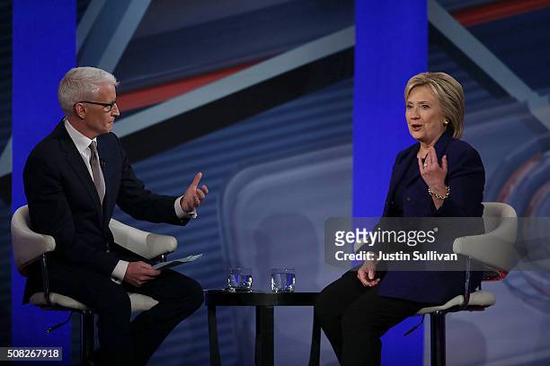 Democratic Presidential candidates Hillary Clinton sits with CNN anchor Anderson Cooper during a CNN and the New Hampshire Democratic Party hosted...