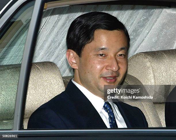 Crown Prince Naruhito arrives at the Imperial Palace on May 11, 2004 in Tokyo, Japan. Naruhito came to the palace to say farewell to his parents...