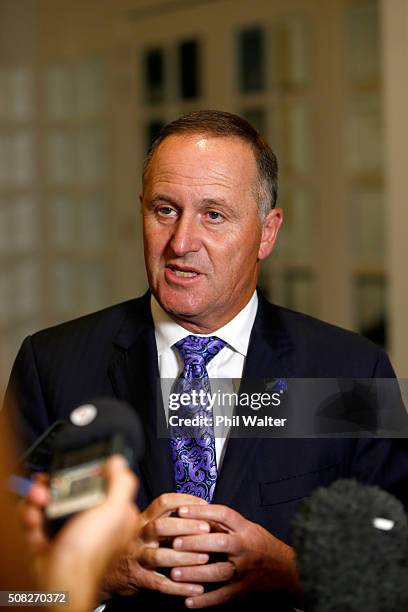 New Zealand Prime Minister John Key speaks to the media during a press conference at the Langham Hotel on February 4, 2016 in Auckland, New Zealand....