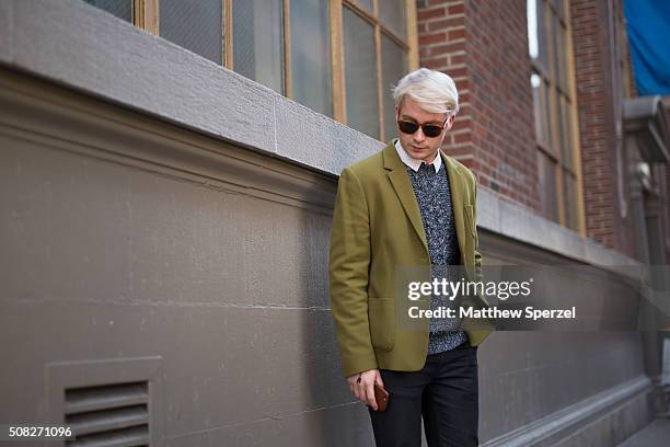 Zac Presley is seen on Spring Street wearing vintage cashmere blazer, Warby Parker glasses, French Connection sweater, Hugo Boss shirt, Nudie Jeans...