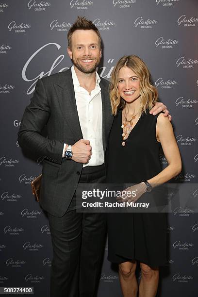 Actor Joel McHale and Sarah Williams attend the Glashutte Original celebrates the launch of manufactory book "Impressions" at Milk Studios on...