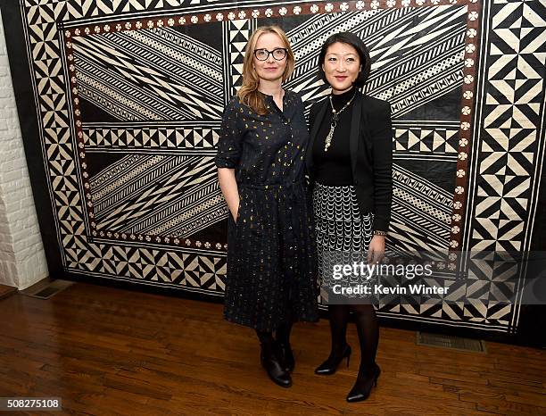 Actress Julie Delpy and Mme Fleur Pellerin, French Minister of Culture and Communications pose at La Residence de France on February 3, 2016 in...