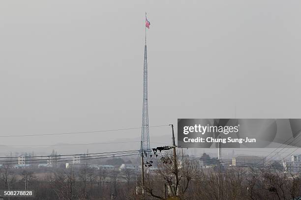 North Korean national flag in North Korea's propaganda village of Gijungdong is seen from an Daeseong-dong Elementary School before the graduation...