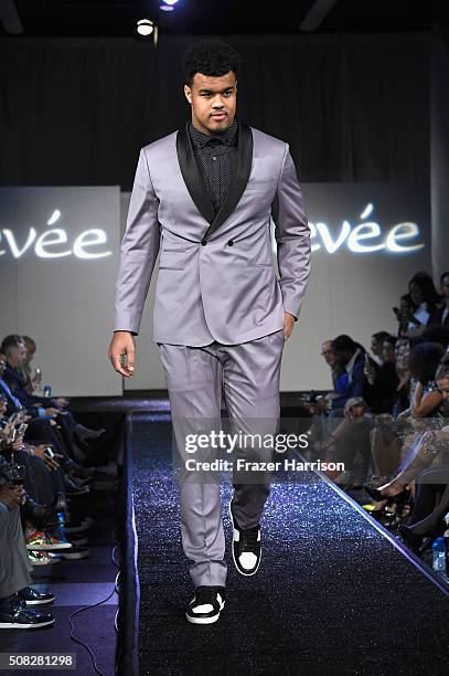 Model walks the runway during Glazer Palooza and Suits and Sneakers on February 3, 2016 in San Francisco, California.